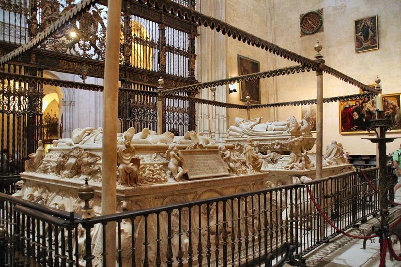Intricately carved tombs inside the Royal Chapel, showcasing historical artistry and cultural heritage on a guided tour.
