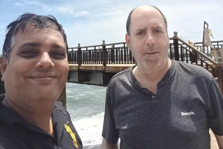 Happy guests at Colombo seaside promenade stop on Royal City Tuk Tuk all-inclusive low price city tour