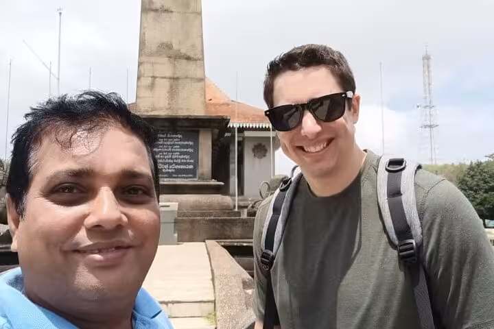 Happy guests with local guide at Colombo landmark on Royal City Tuk Tuk all-inclusive city tour Sri Lanka