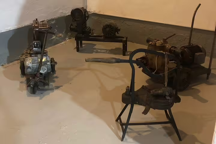 Vintage wine-making equipment displayed on the Rueda White Wine Tour with Michelin-Star Lunch from Madrid.