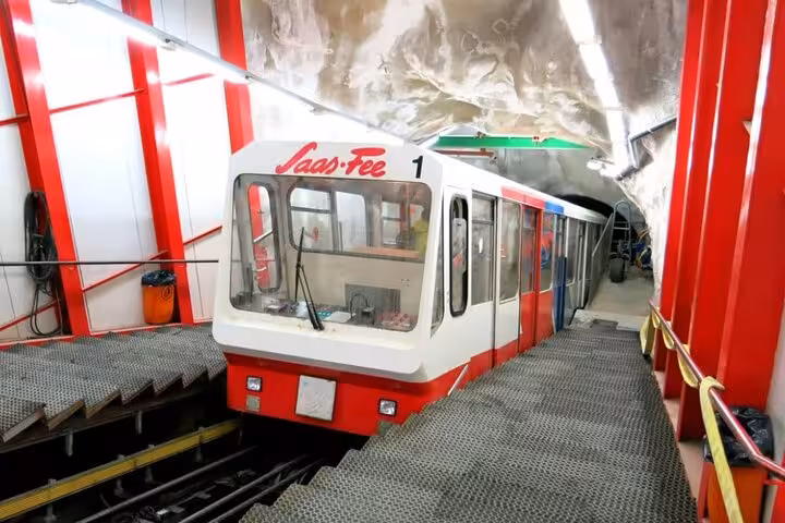Saas-Fee Metro Alpin funicular inside tunnel, key ride on Zurich day trip to Allalin revolving restaurant