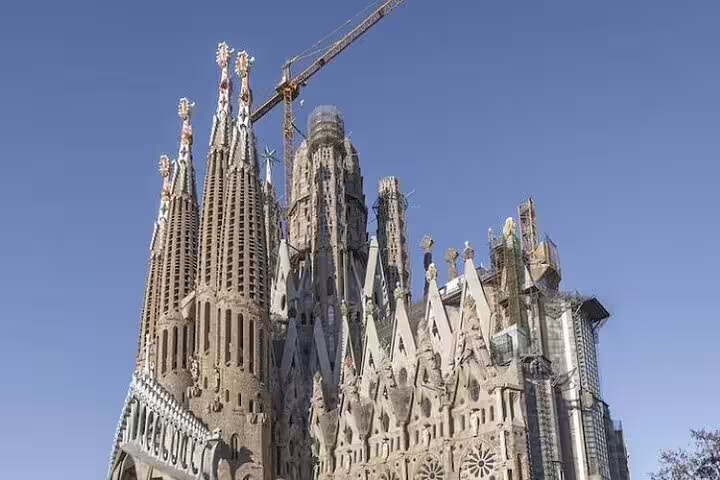 Exterior view of Sagrada Familia basilica towers under construction, visited on a priority access insider tour in Barcelona