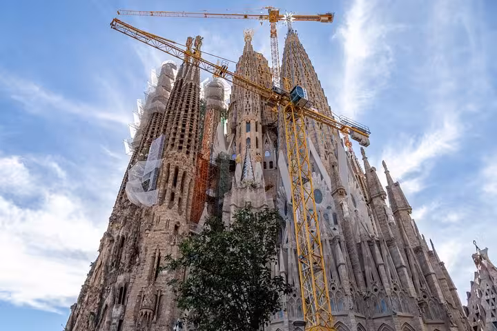 Sagrada Família spires in Barcelona, iconic Gaudí landmark featured on Modernism walking tour route