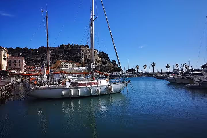 Sailboats in Cassis harbor on a private shore excursion from Arles to Cap Canaille and Aix-en-Provence