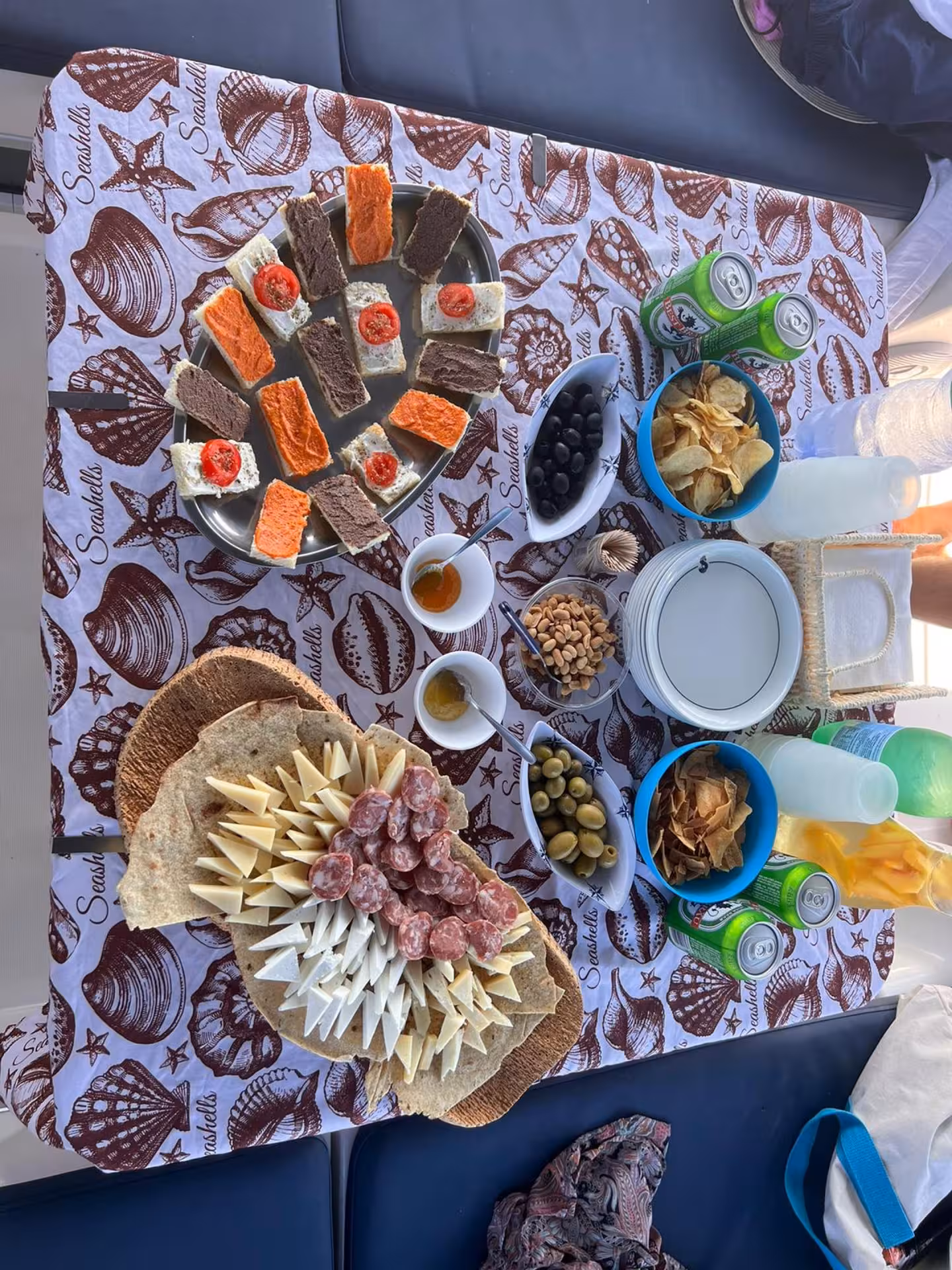 Gourmet Italian snacks and drinks on a sailing trip from Santa Teresa di Gallura to Corsica.