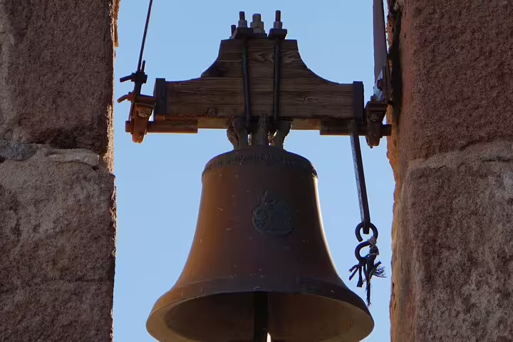 Historic bell at Saint Catherine Monastery, highlight of private overnight Cairo to Mount Sinai trip