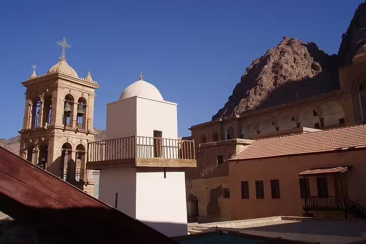 Saint Catherine’s Monastery courtyard with bell tower and chapel, a highlight of Dahab half-day Sinai tour