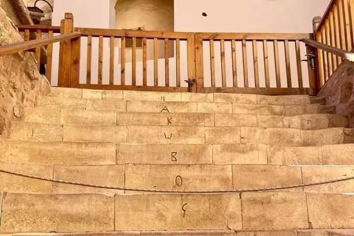 Monastery stone staircase and wooden railing at Saint Catherine’s, part of Sharm El Sheikh to Dahab tour