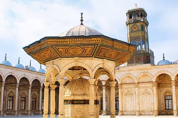 Ornate courtyard pavilion and clock tower at Saladin Citadel, highlight of private Cairo day tour