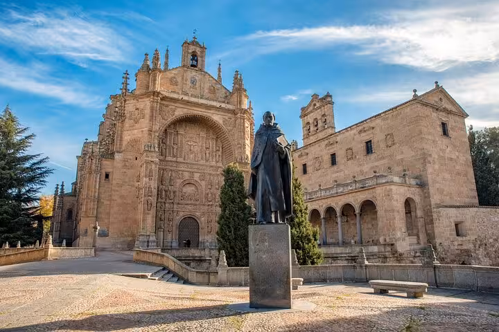 Statue and ornate facade of the Convento de San Esteban in Salamanca, highlighted on the private 2-hour city tour.