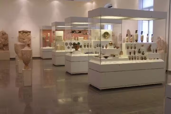 Archaeological museum exhibits on Salamina Island, a cultural stop on a full-day private tour from Athens