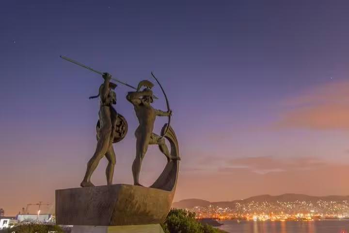 Sunset view of Salamis naval monument statue overlooking the sea, highlight of Salamina Island private day tour