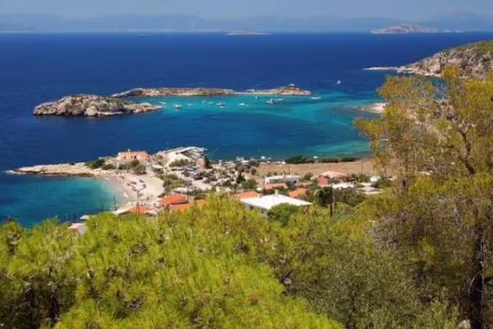 Panoramic view of turquoise coves and islets near Salamina Island on a full-day private tour from Athens