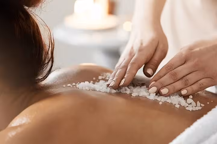 Salt scrub exfoliation during solo spa treatment in Sharm El Sheikh, royal hammam ritual and full-body renewal