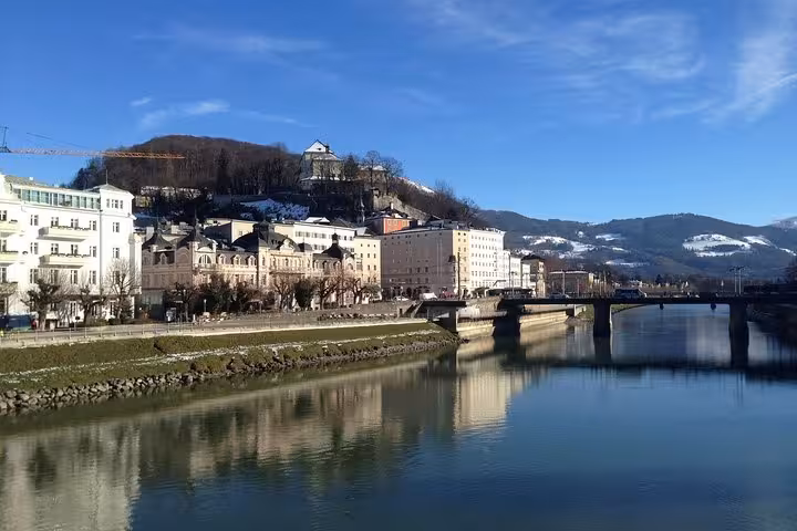 Salzburg old town skyline along the Salzach River on a private day tour from Vienna with local guide