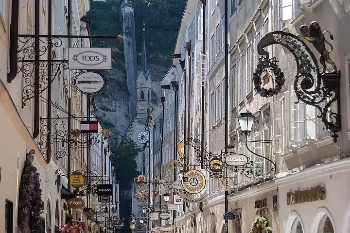 Salzburg Old Town shopping street, scenic stop on Vienna to Salzburg private transfer with Hallstatt detour