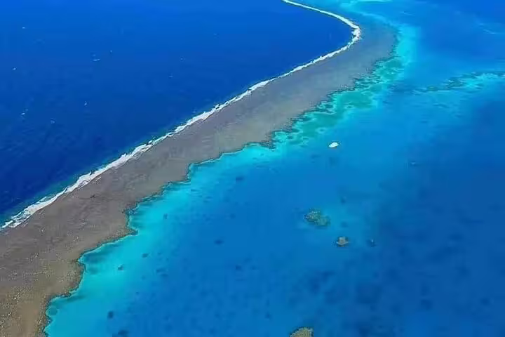 Aerial view of Samadai Reef near Marsa Alam, Red Sea lagoon route for VIP dolphin snorkeling tour