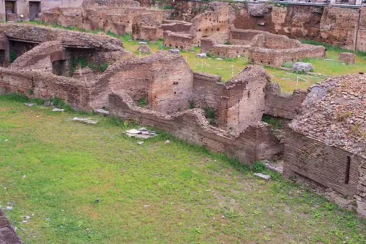 Ancient brick ruins beneath San Clemente Basilica on a private Rome underground archaeology tour with skip-the-line tickets