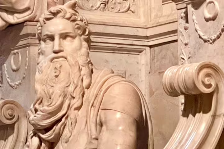 Close-up of a majestic marble statue inside Rome’s San Clemente Basilica, seen on an exclusive underground no-line tour