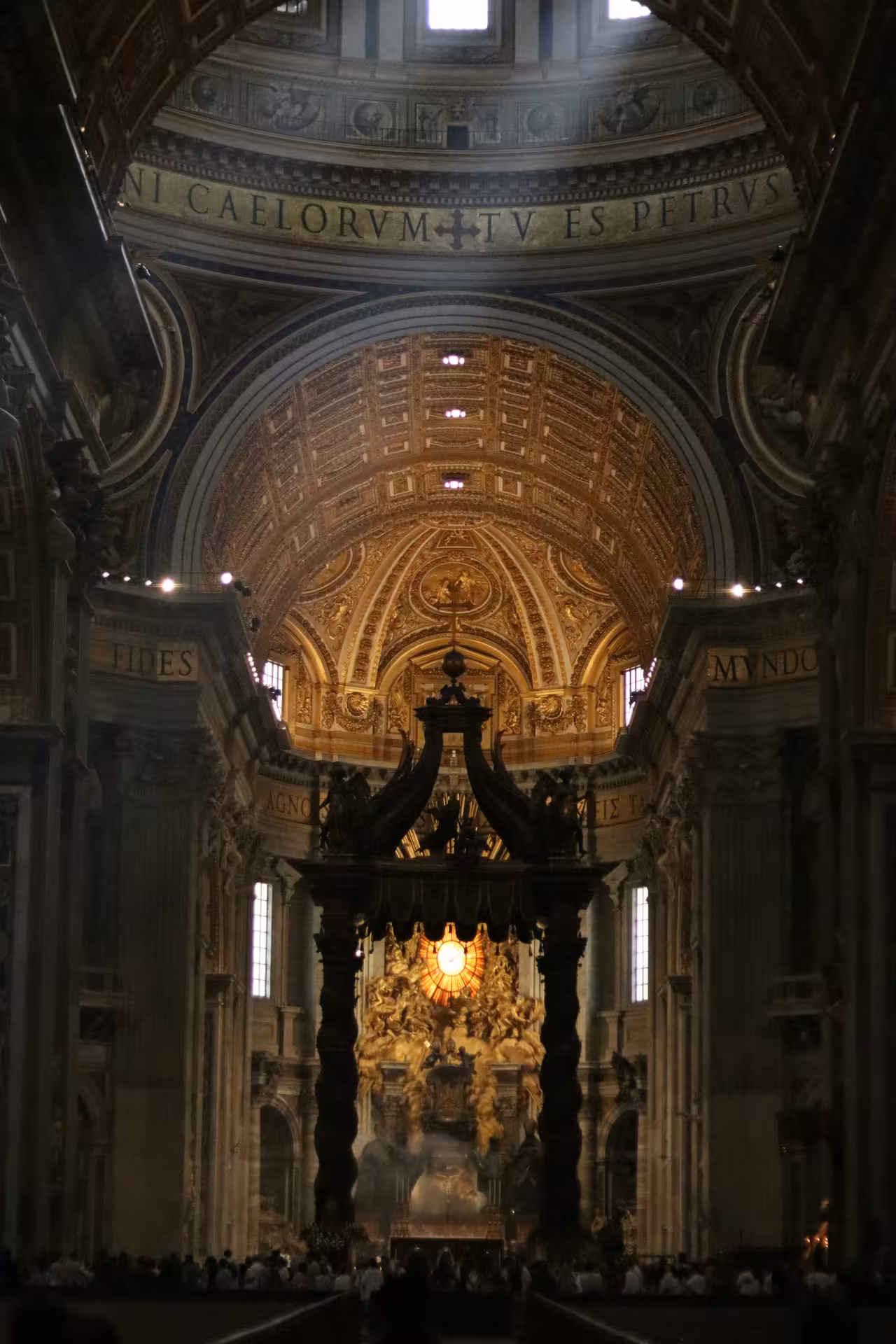 The majestic interior of St. Peter's Basilica with its ornate dome, a highlight of the San Pietro Basilica Combo Tour.