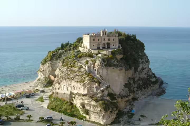 Sanctuary of Santa Maria dell’Isola perched on a rocky promontory above Tropea beach on the Tyrrhenian Sea coast