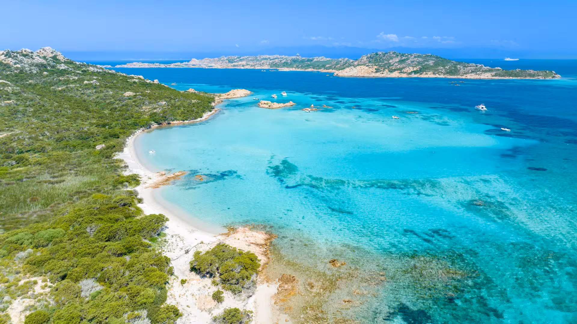 Pristine beach and turquoise sea at Santa Teresa di Gallura, perfect for a private RIB adventure.