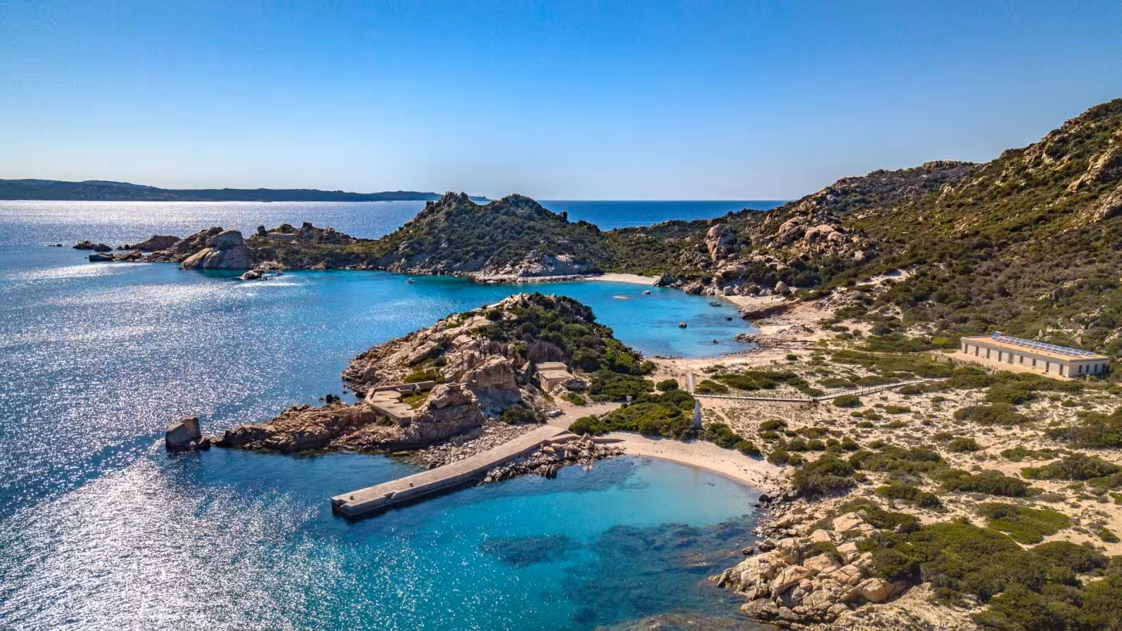 Scenic view of rugged coastline and turquoise waters in Santa Teresa di Gallura, ideal for a private RIB tour.