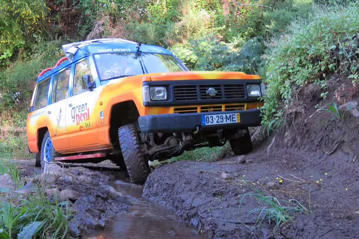 4x4 off-road vehicle navigating rugged terrain during the Santana & Peaks tour, showcasing exciting adventure travel in nature.