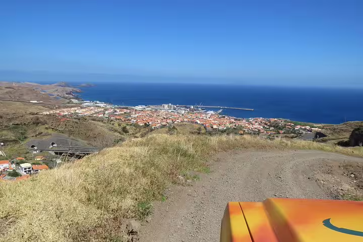 Explore breathtaking coastal views and rugged landscapes on the Full Day Santana Wonders and Northeast 4WD Experience in Madeira.