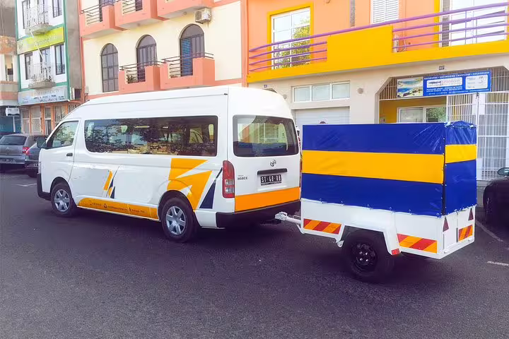 Private airport transfer van in Praia, Santiago Island, Cape Verde, 1-way ride to Cidade Velha with luggage trailer