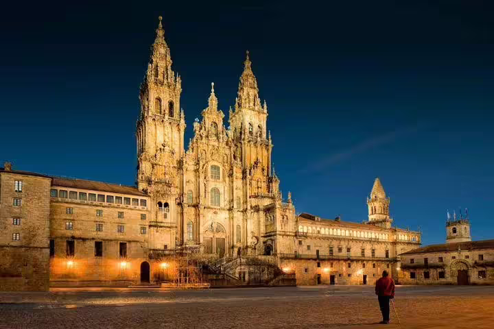 Illuminated Santiago de Compostela Cathedral at night, a key highlight on the Porto to Santiago full day tour.