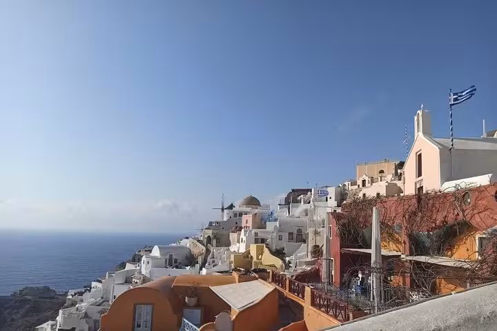 Fira cliffside village with white domes and Aegean Sea views, Santorini highlights day tour from Crete