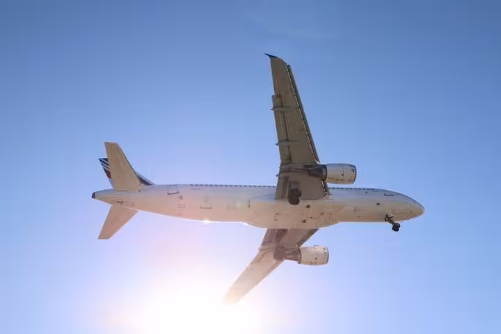 Airplane arrival for Santorini day getaway with luxury villa stay, airport transfer and transport included