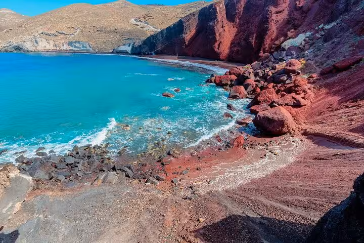 Santorini Red Beach volcanic cliffs and turquoise water, a highlight stop on a 5-day private tour from Athens