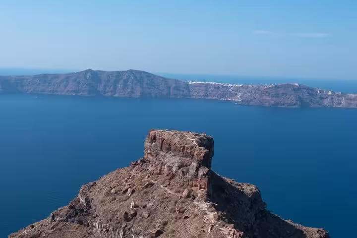 Santorini caldera cliff viewpoint on Thera 8-hour island tour with scenic stops and wine tasting