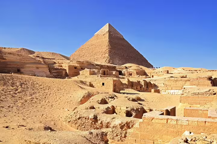 Saqqara desert panorama with ancient tomb ruins and pyramid, featured on the Giza, Saqqara and Dahshur day tour