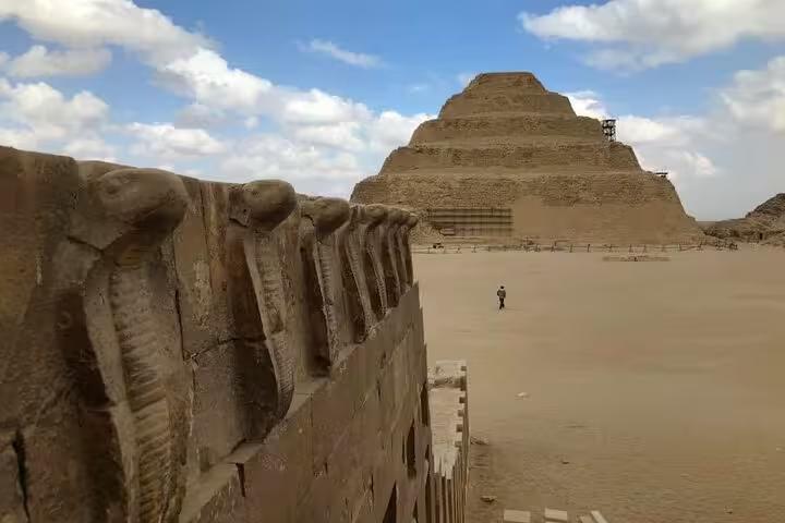 View of Saqqara Step Pyramid with temple wall carvings, private Giza Pyramids, Memphis tour and camel ride