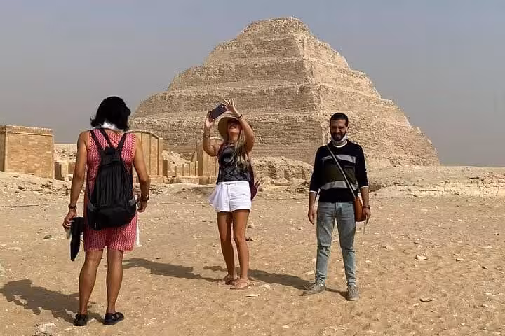 Tourists at Saqqara Step Pyramid on a private Giza, Memphis and Saqqara day tour from Cairo