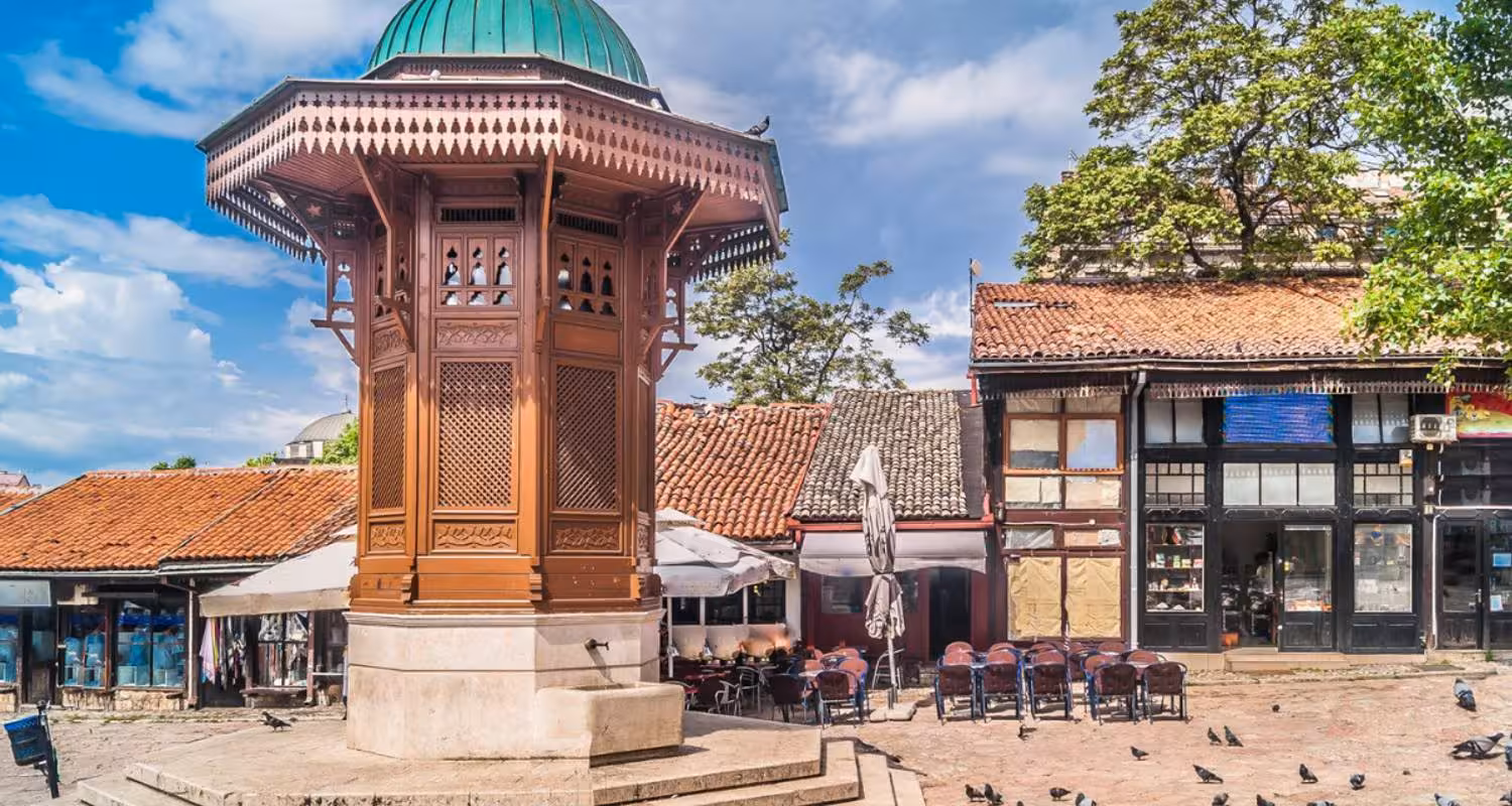 Traditional architecture in Sarajevo's bustling old town on Balkan tour.