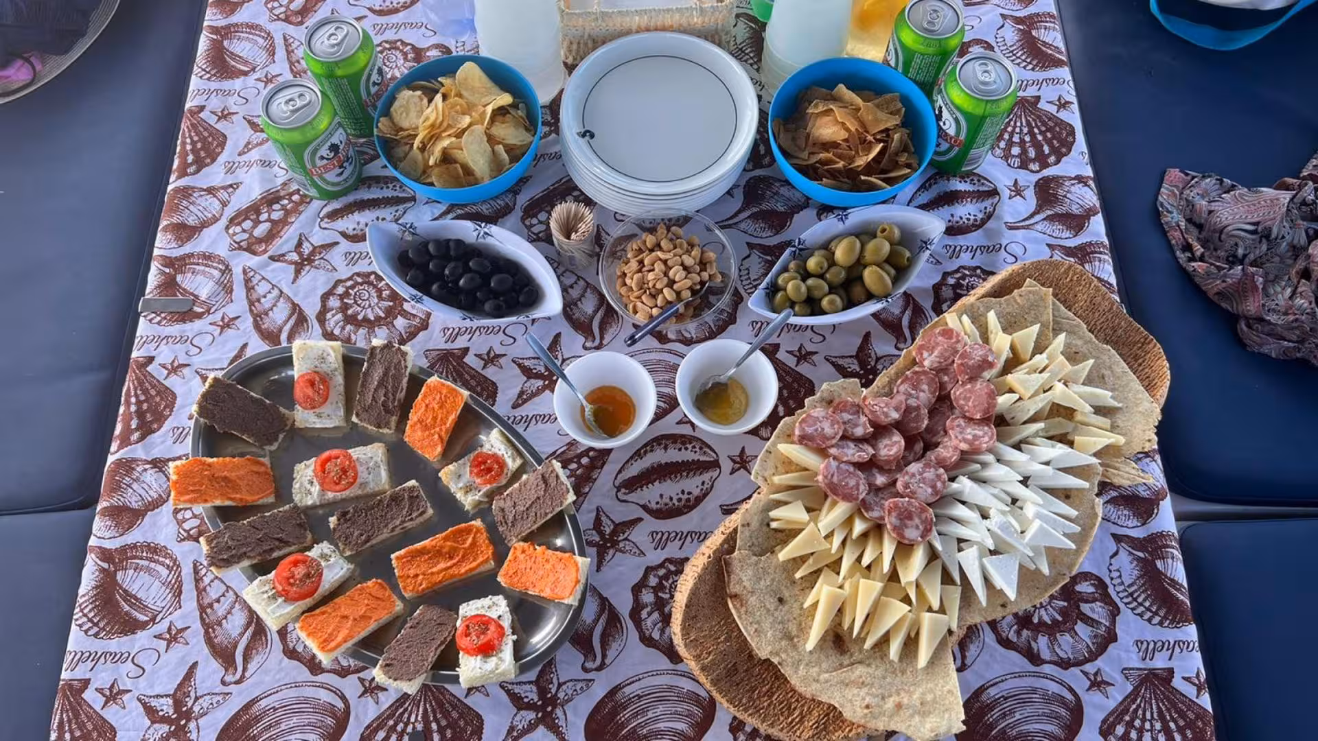 Delicious Sardinian antipasto spread on a sailing trip to La Maddalena Archipelago from Santa Teresa di Gallura.
