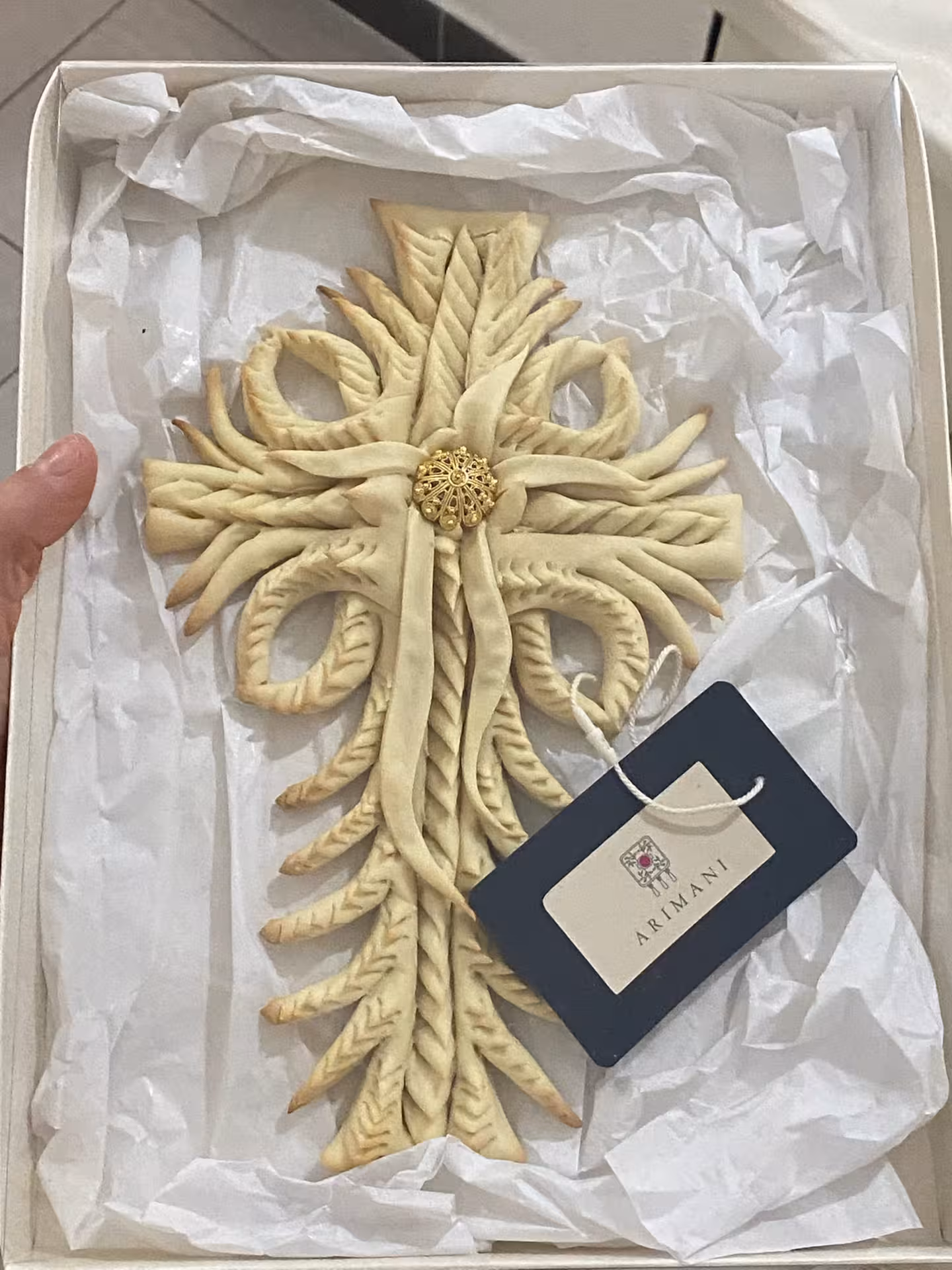 Intricate Sardinian bread art in decorative box, part of Olbia's authentic pasta workshop experience.