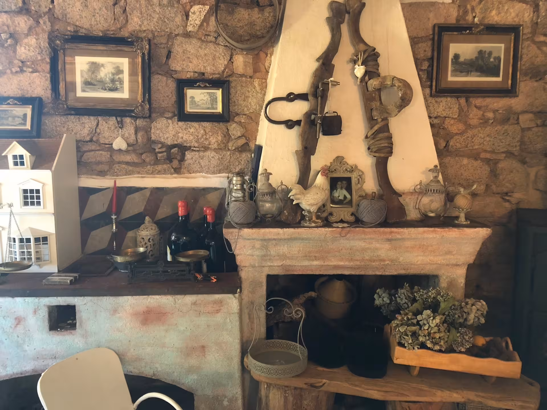 Charming Sardinian kitchen interior with rustic decor and vintage accents, ideal setting for a pasta workshop in Olbia.