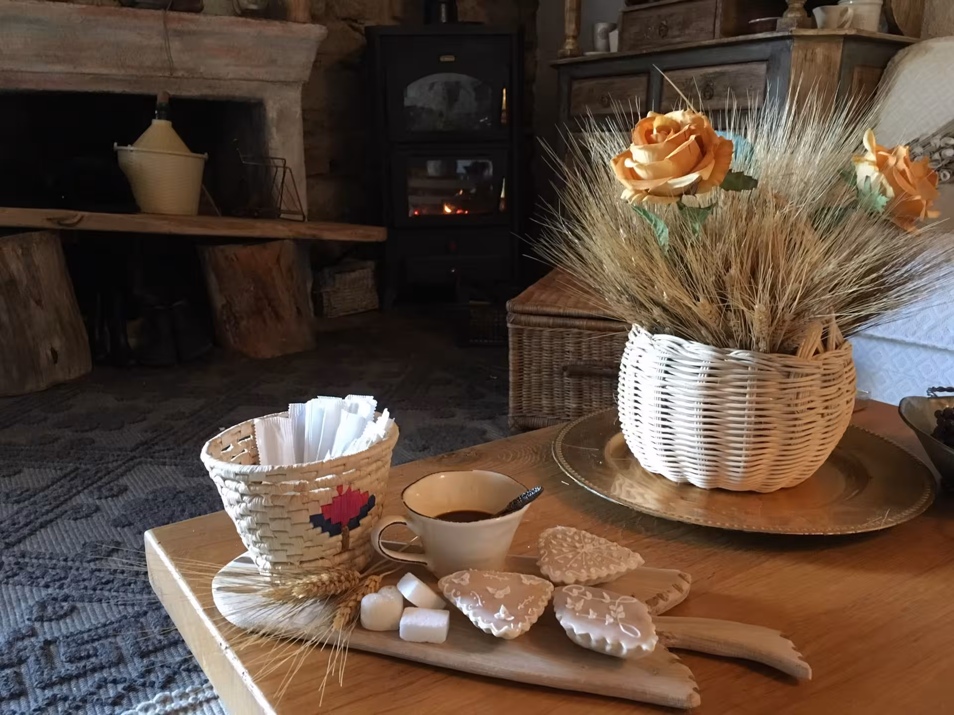 Cozy interior with rustic fireplace and traditional Sardinian decor, ideal setting for a pasta workshop in Olbia.