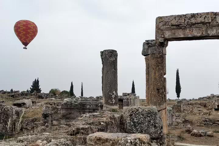 Ancient ruins with stone columns at Sardis on the Seven Churches of Asia Minor tour from Smyrna