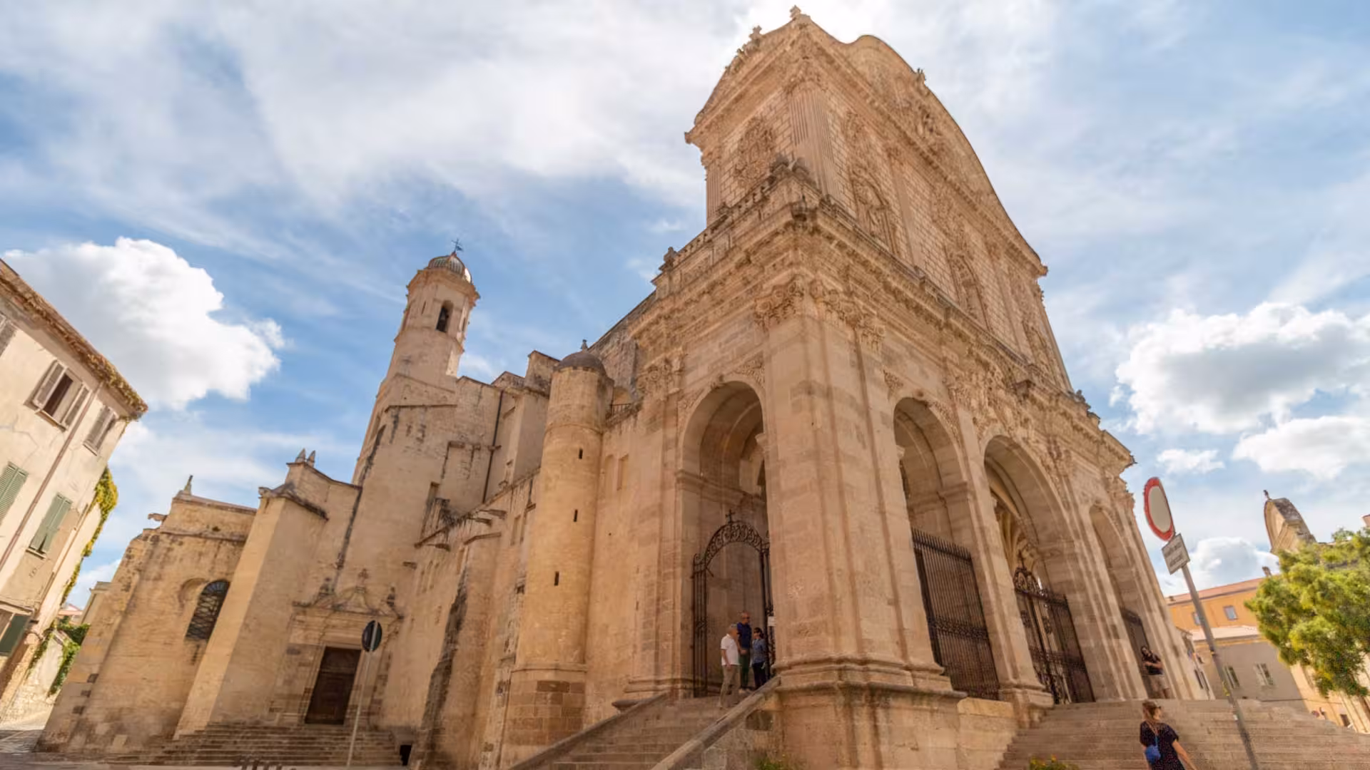 Majestic facade of a historic cathedral in Sassari, showcasing intricate architecture for cultural exploration.