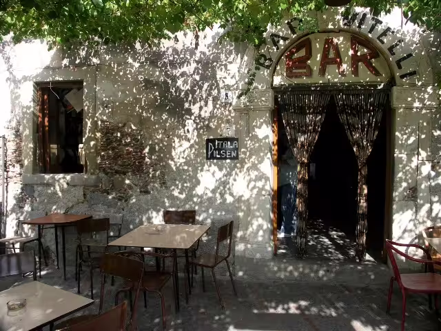 Savoca Bar Vitelli courtyard café, iconic stop on the Godfather villages and Taormina shore excursion from Messina