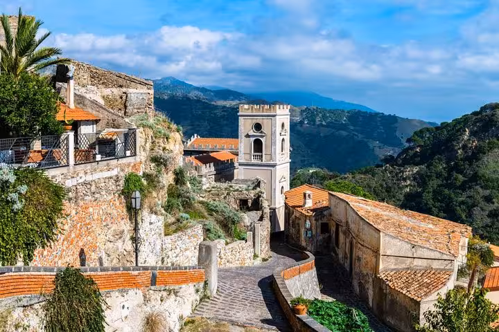Picturesque view of Savoca village with historic architecture on the Godfather trail from Messina port.