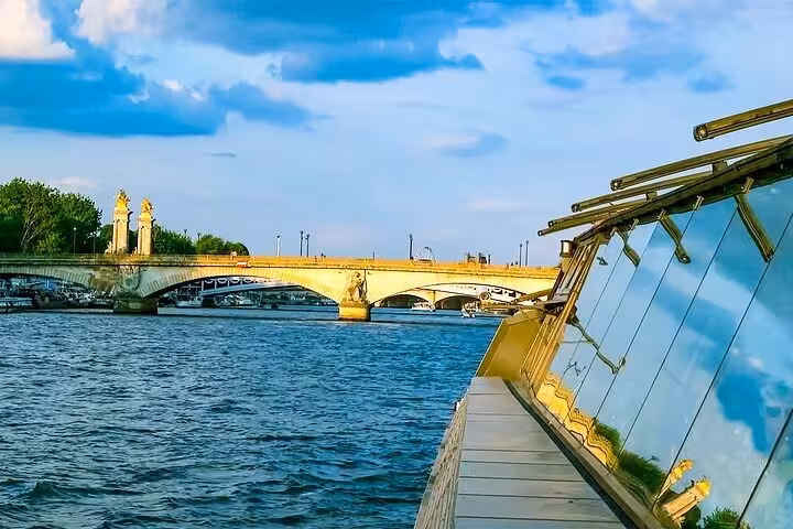 Seine cruise perspective of Pont Alexandre III from boat deck, perfect after Louvre tour and breakfast