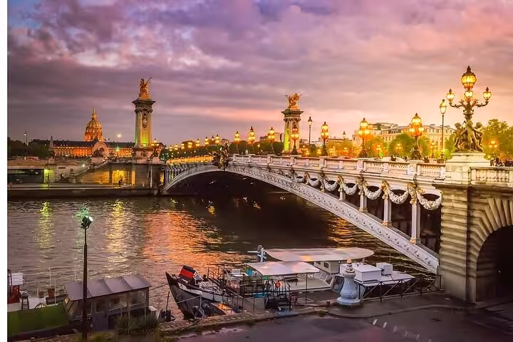 Sunset Seine River cruise in Paris near Pont Alexandre III, ideal add-on to a Louvre guided visit