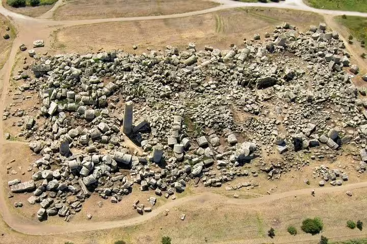Aerial view of collapsed ancient temple stones at Selinunte Archaeological Park visited on a private day trip from Palermo